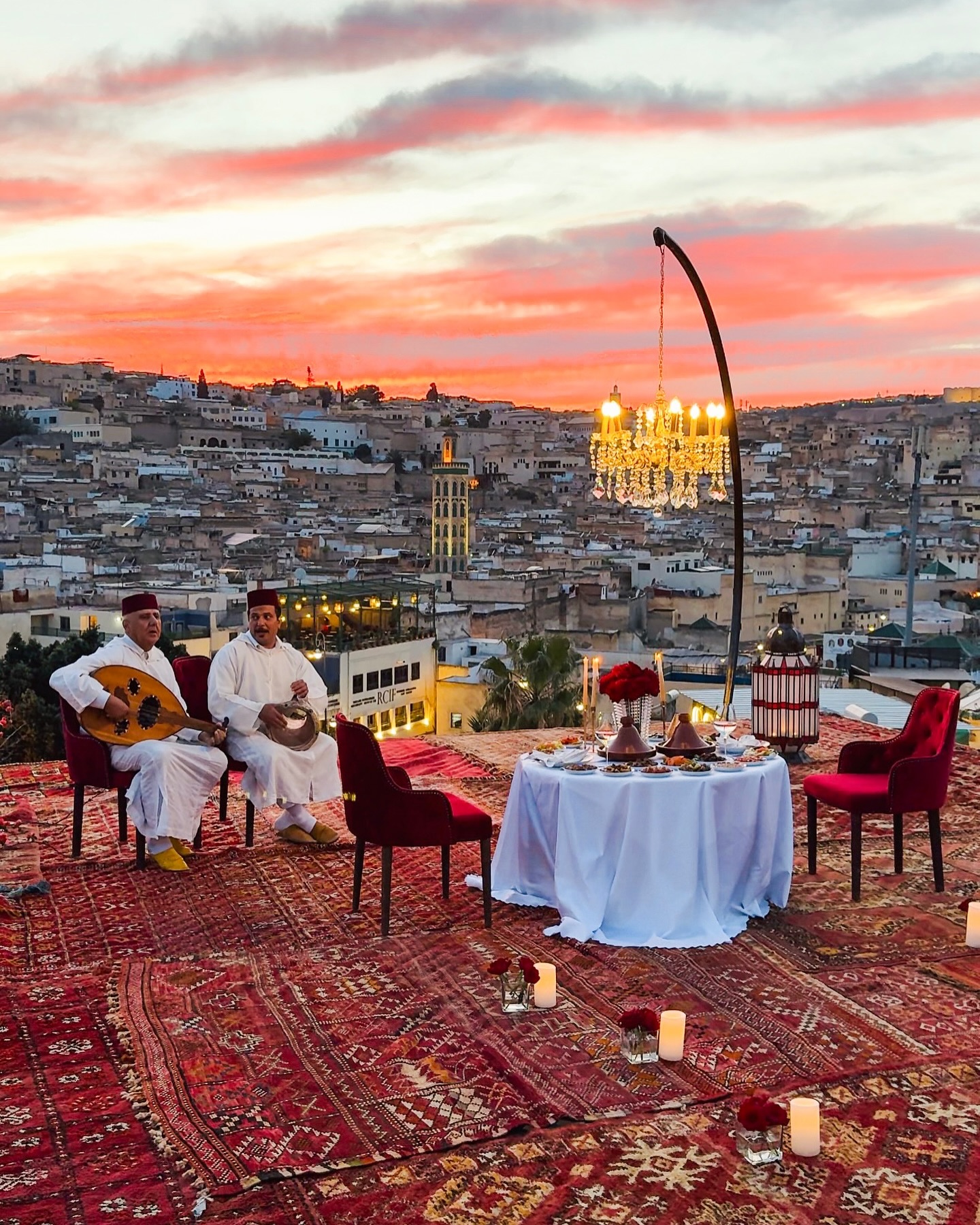 Private rooftop dining in Marrakech with candlelit elegance and panoramic medina views