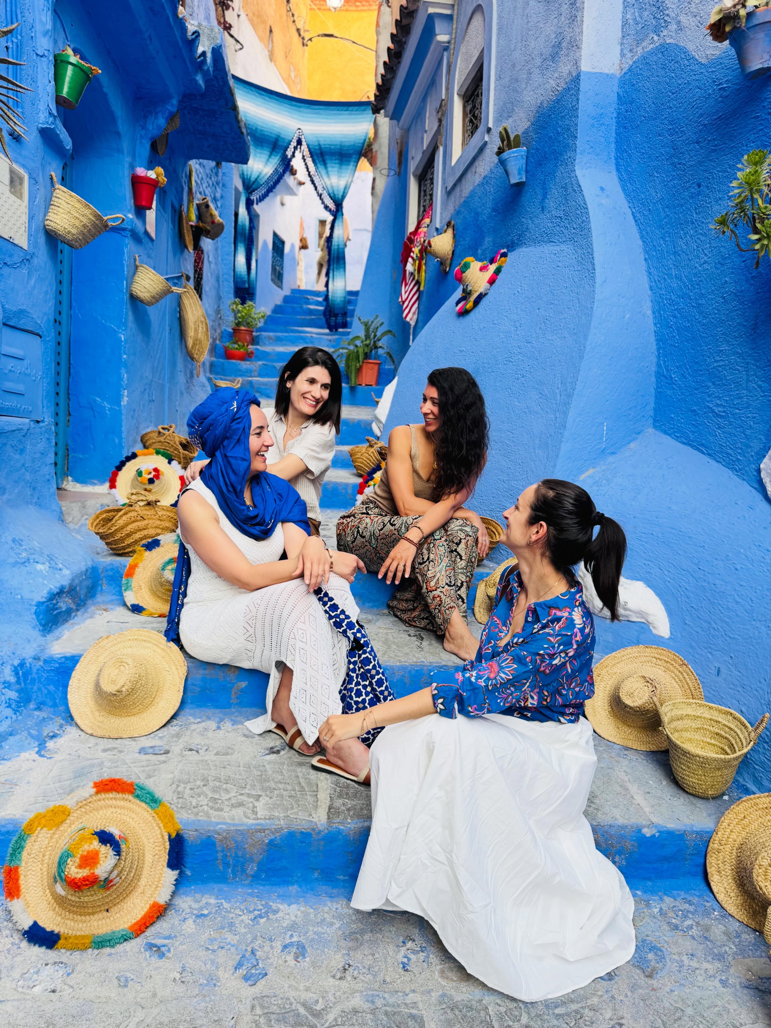 Group of friends in Chefchaouen, the blue city of Morocco